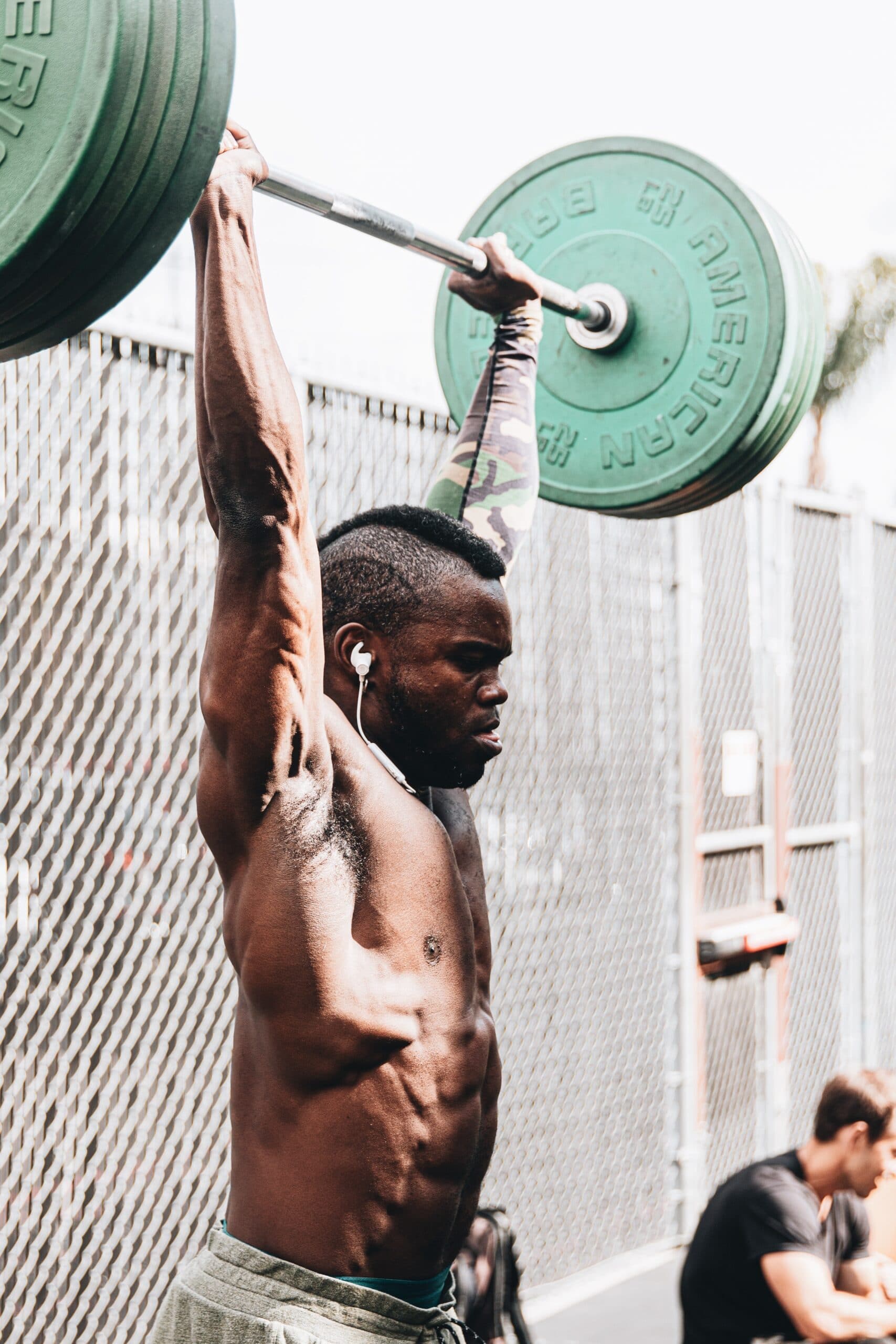 Athlete performing The Overhead Press