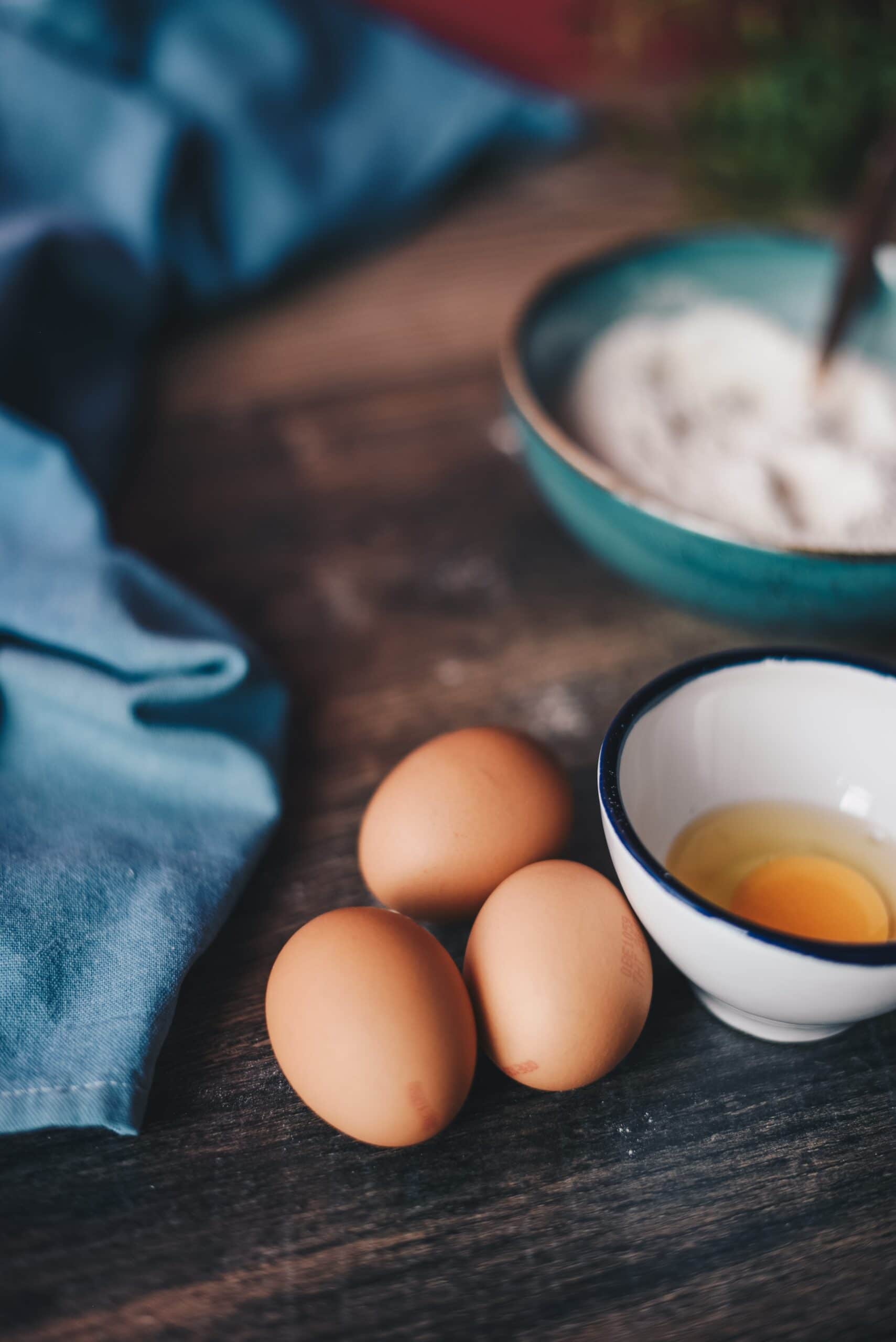 eggs on wooden table against vitamin d deficiency