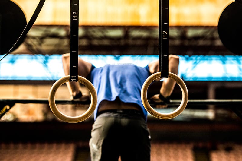 Athlete performing muscle up