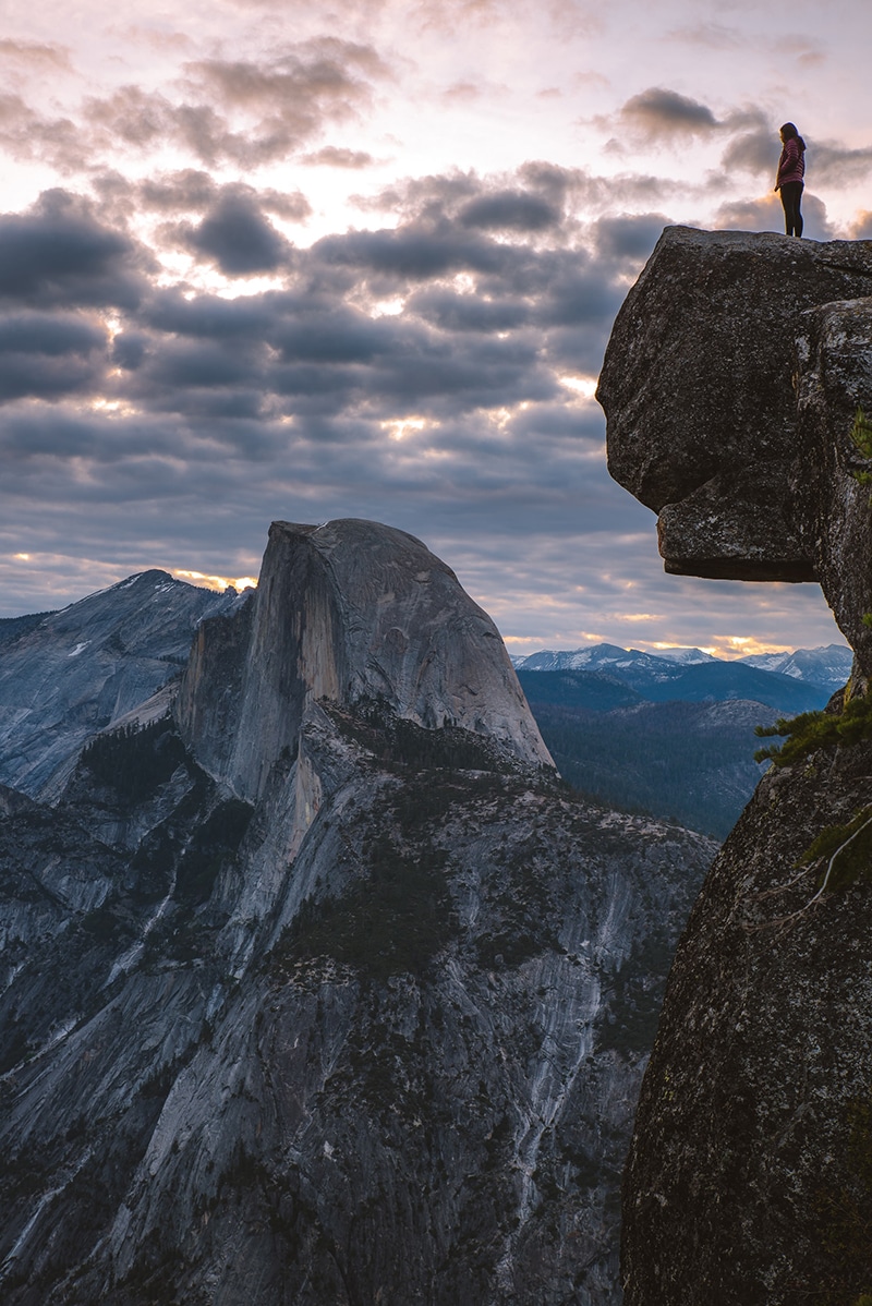 Person standing on rock outdoors