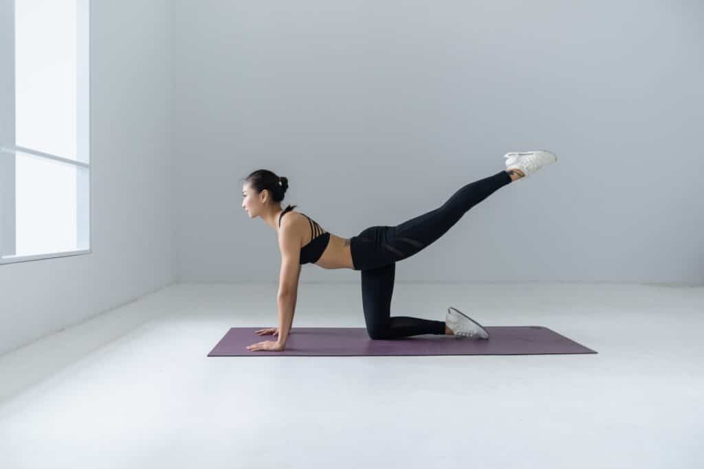 Plank exercise workouts in a white room