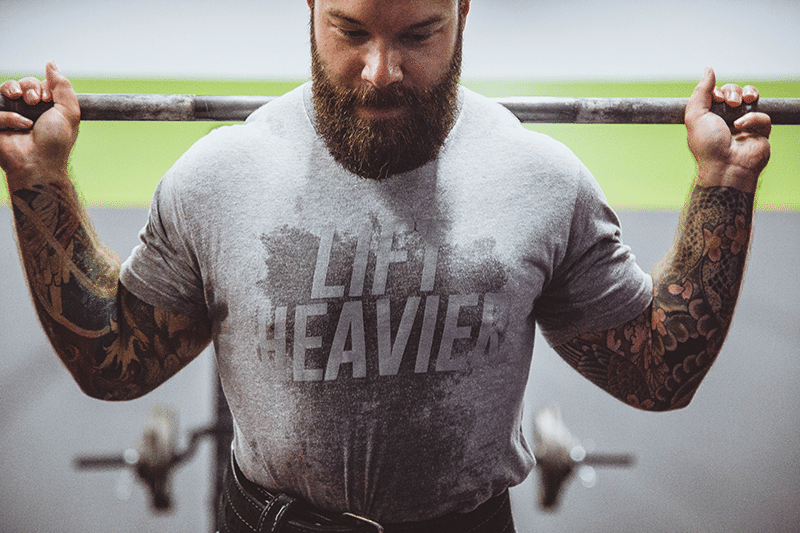 Man with barbell on his back