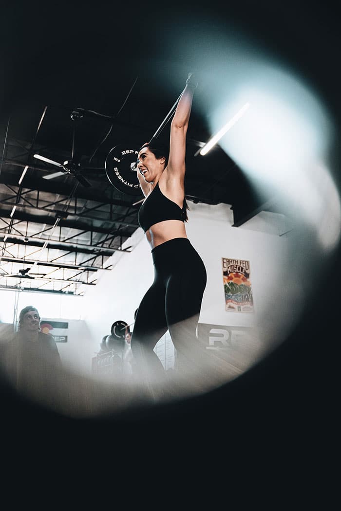 Woman lifting in gym