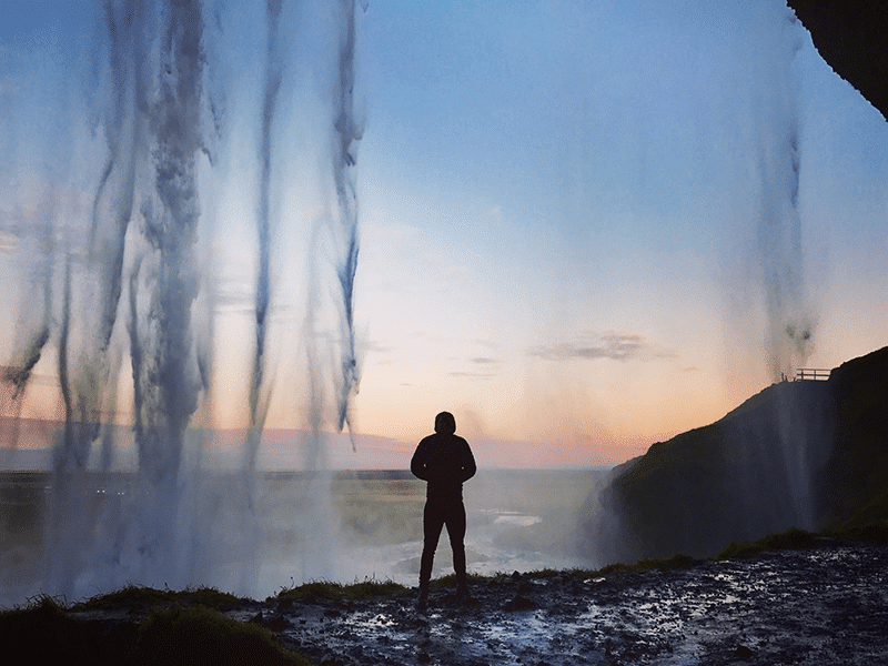 Waterfall and man