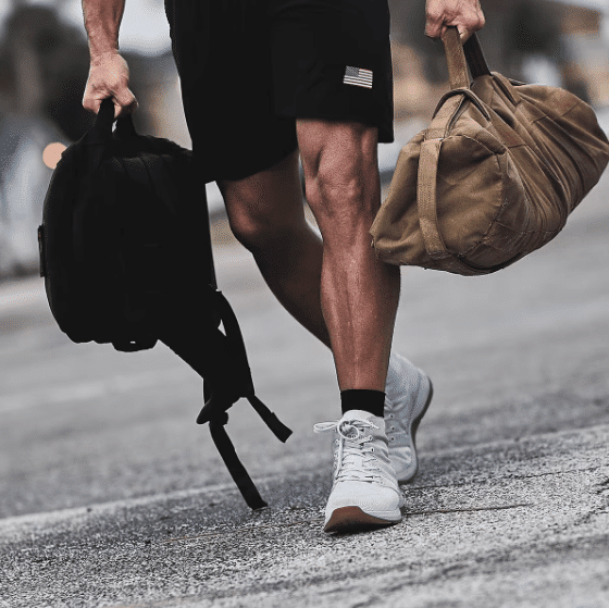 Athlete carrying bags