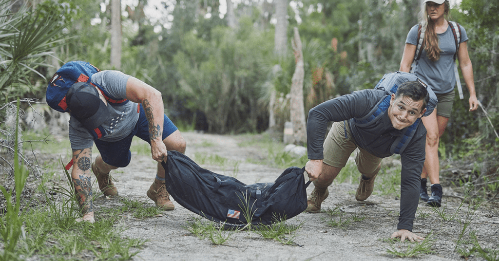 Athletes-Carrying-Bag-During-Training