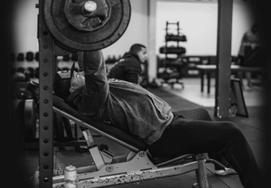 Man in gym on bench press