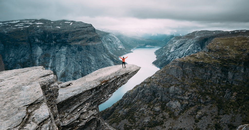 Man in Norway standing on a Rock