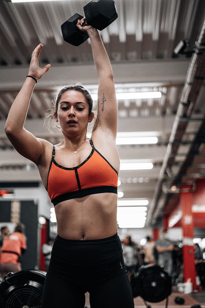 Woman working out with dumbbell