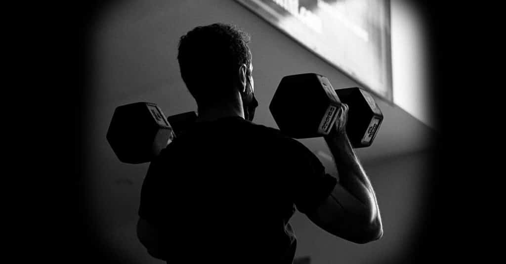 Man-Doing-Dumbbell-Push-Press