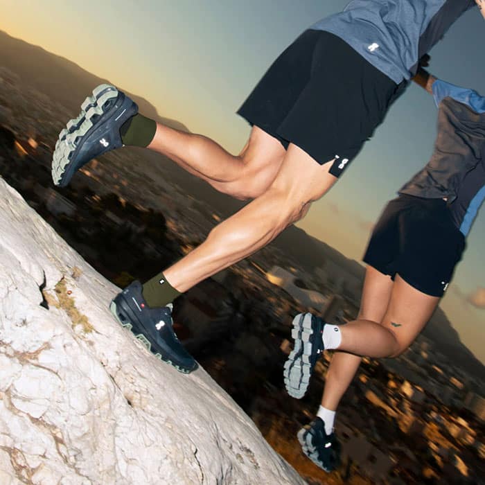 People running on rocks