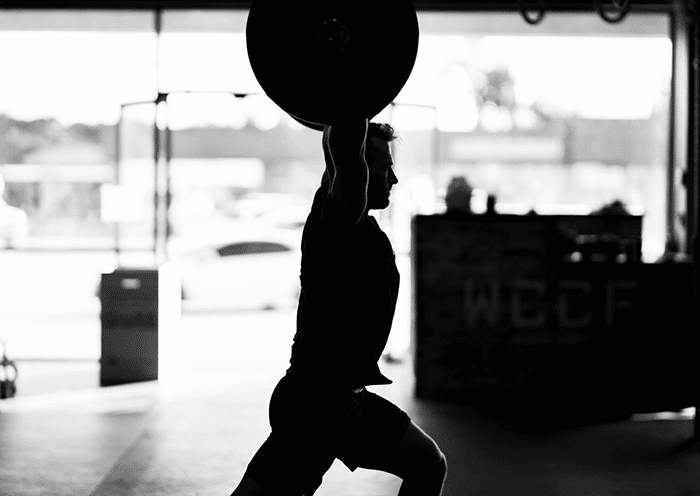 Man doing clean and jerk exercise