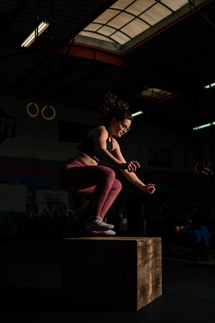 Woman doing box jumps