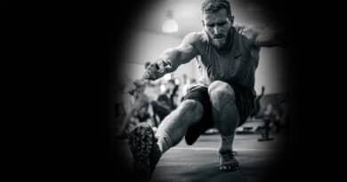 Male athlete during pistol squat workouts