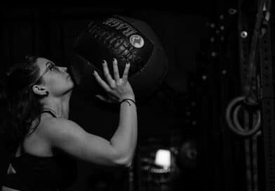 Women-Performing-Wall-Balls-Exercise