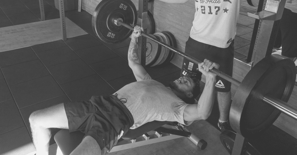 Decline barbell bench press with male athletes