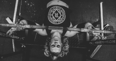 Woman doing barbell bench press