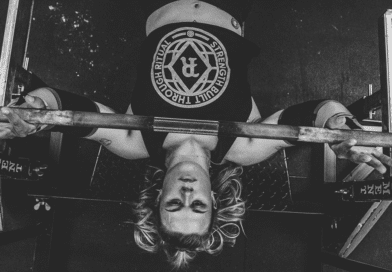 Woman doing barbell bench press