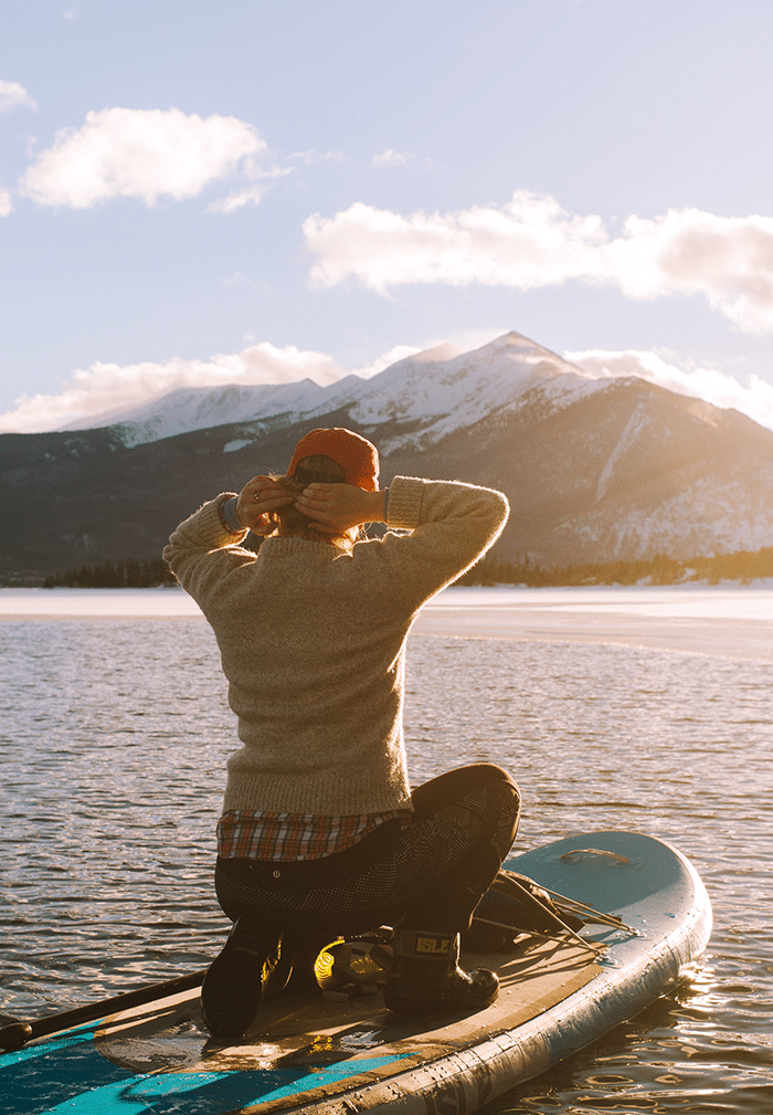 Woman doing workout on paddleboard