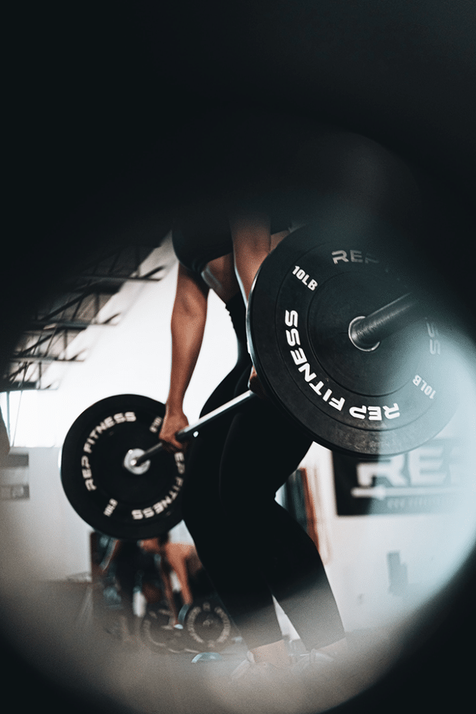 Person lifting barbell