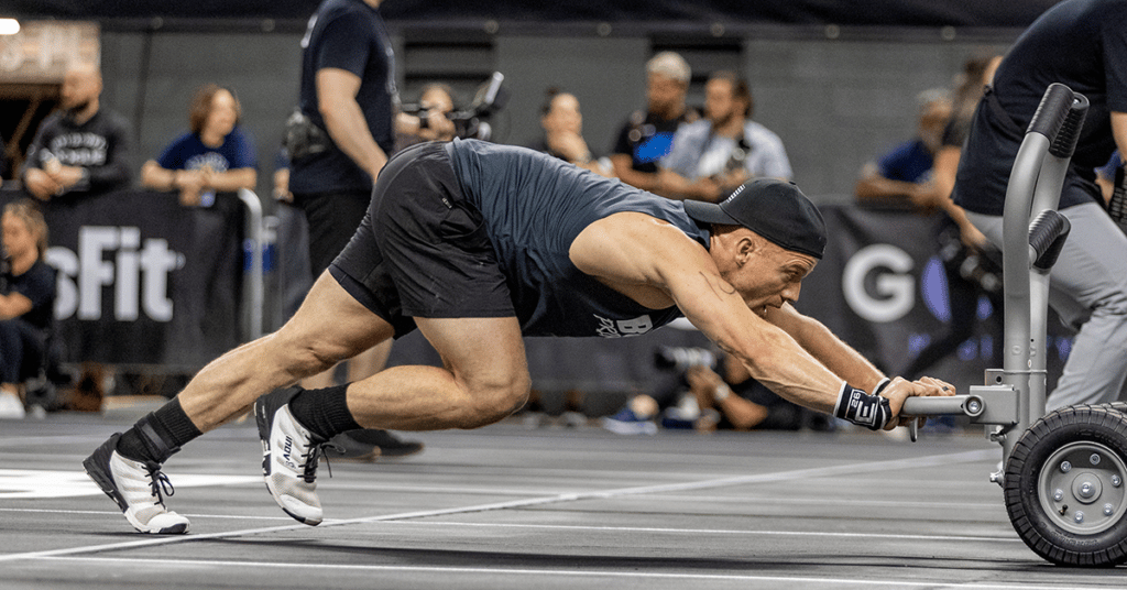 Scott Panchik pushing sled