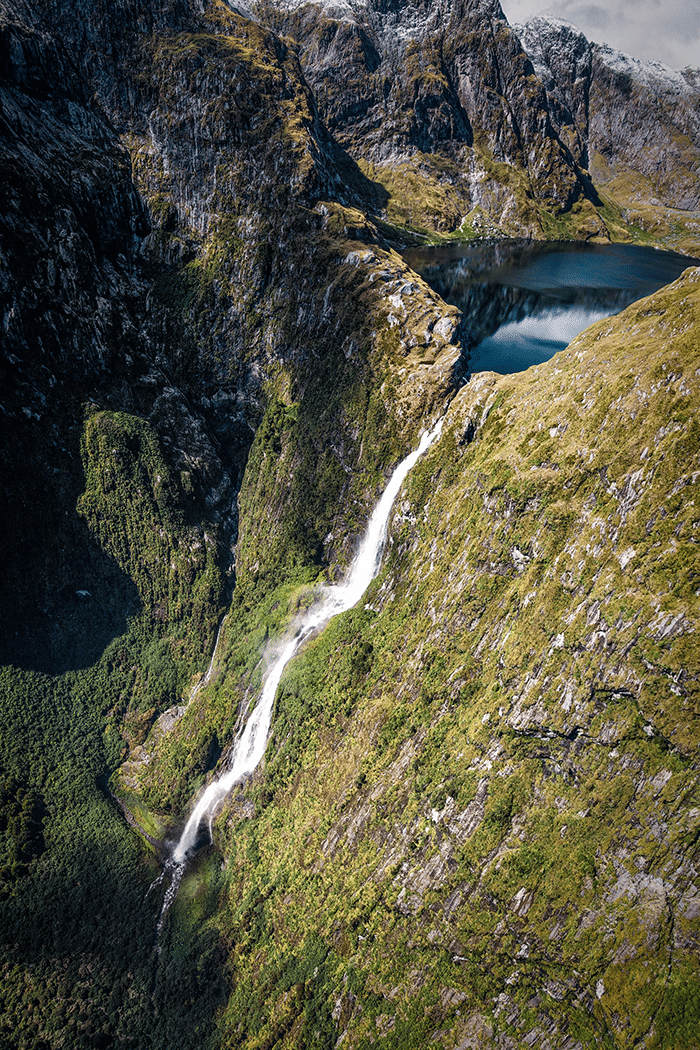 Waterfall near best camping sites in new zealand for families