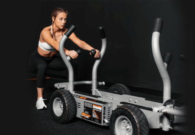 Woman working with Torque Fitness Tank sleds