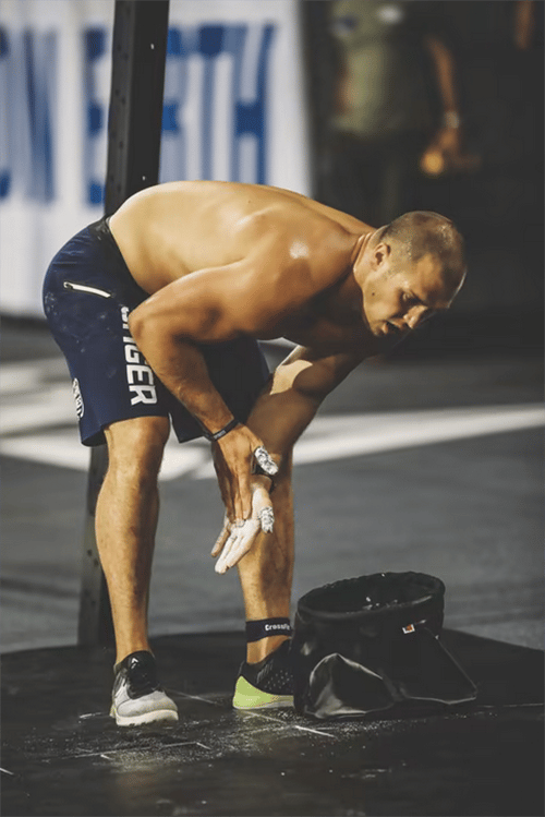 Athlete during competition with chalk bag