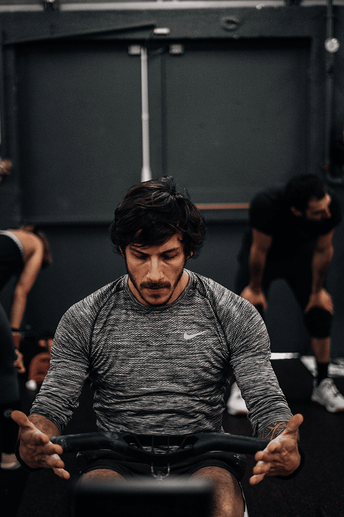 Man getting ready before rowing workout