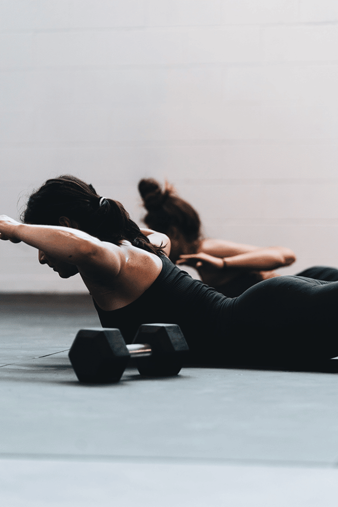 Woman stretching her back