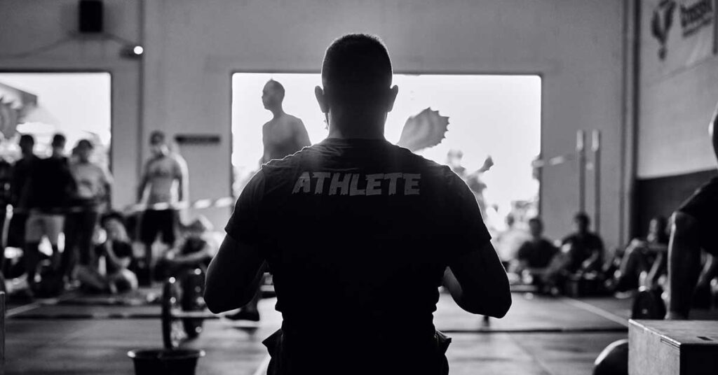 man in gym in black and white