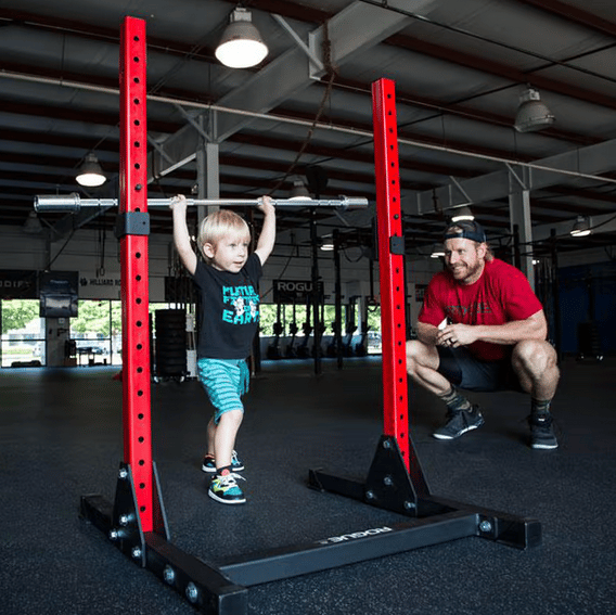 Kid with barbell in Rogue KS-1 Kids Squat Stand