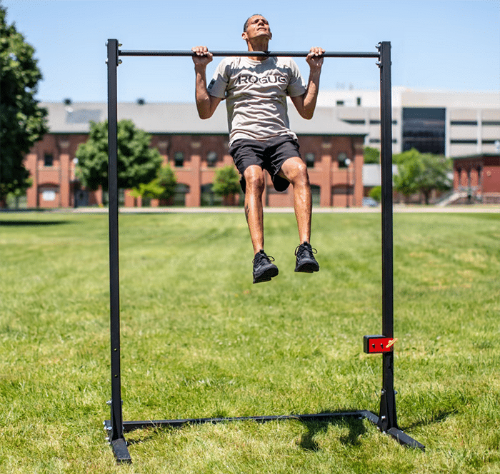 Man on Rogue Pull Up Bar Stand
