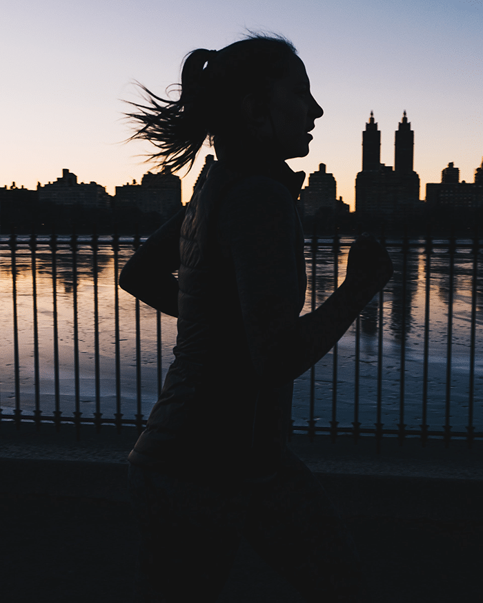 Humans running in city