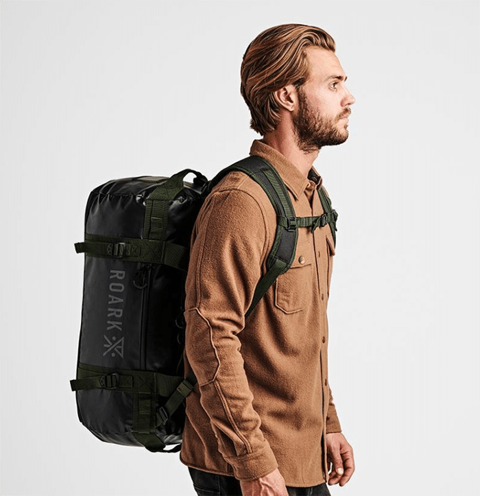 Roark Duffel Bags side view with man