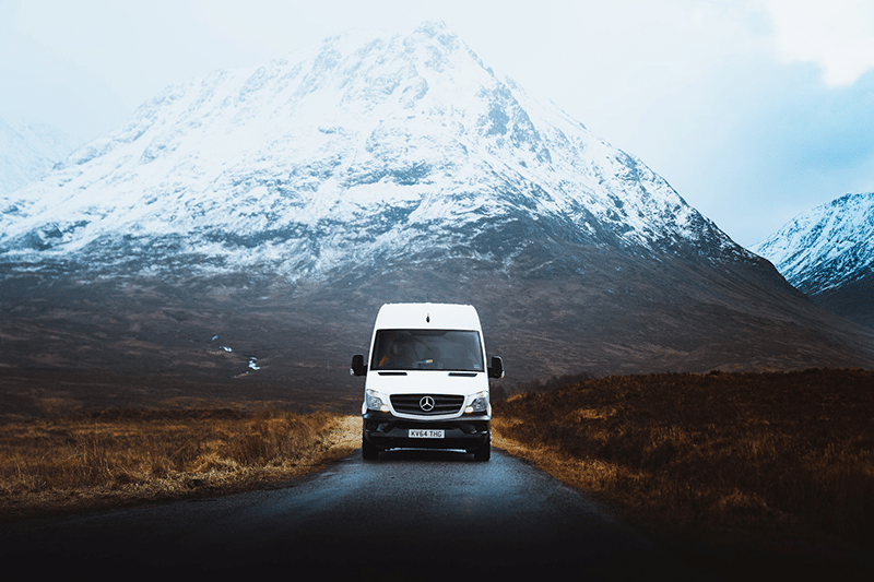 Van by a mountain