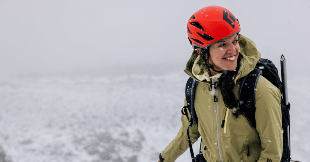 Woman hiker in Helly Hansen shell jacket