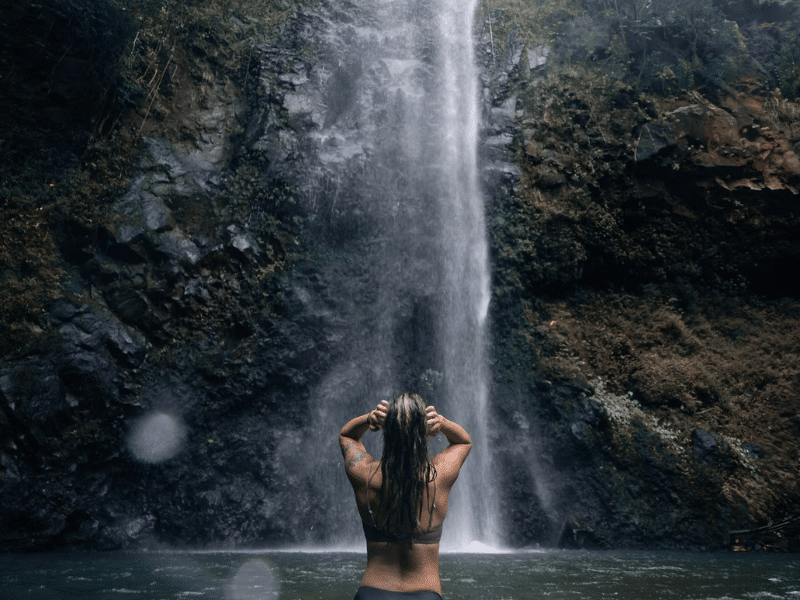 Hiker stops for a waterfall swim