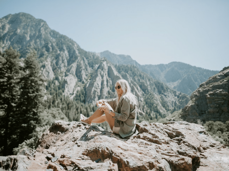 Hiker stops for a snack in the mountains