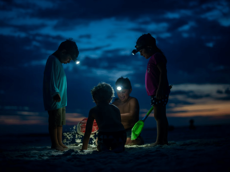 Kids playing outdoors on the beach