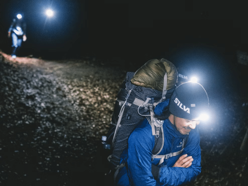 Happy hikers on a night adventure